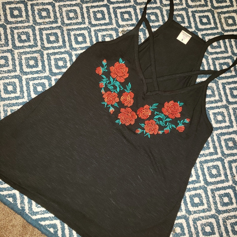 black tank top with rose detailing.
